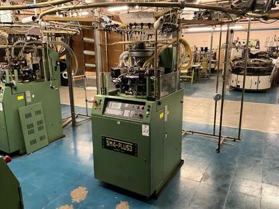 Overzichtsfoto van 2003 Santoni SM4- PLUS3 circular knitting machine