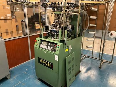 Overzichtsfoto van 2002 Santoni SM4- PLUS3 circular knitting machine