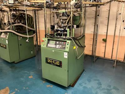 Overzichtsfoto van 2002 Santoni SM4- PLUS3 circular knitting machine