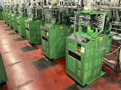 Immagine panoramica di (8x)  Matec Silver 2 knitting machine