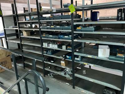 Overzichtsfoto van diverse reserveonderdelen Oilquick